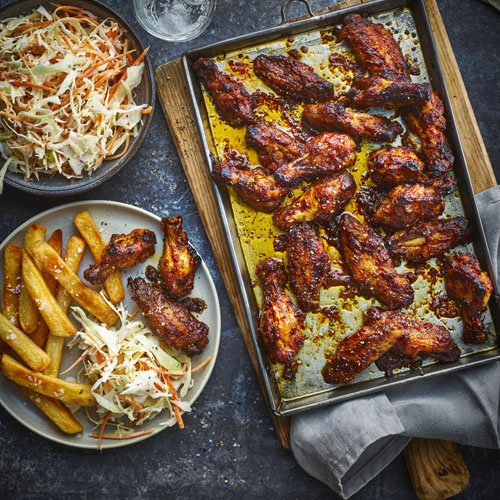 SMOKIN’ HOT HONEY CHICKEN WINGS, CHIPS AND SLAW