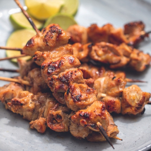 TAMARIND AND CHICKEN SKEWERS WITH GREEN MANGO SALAD